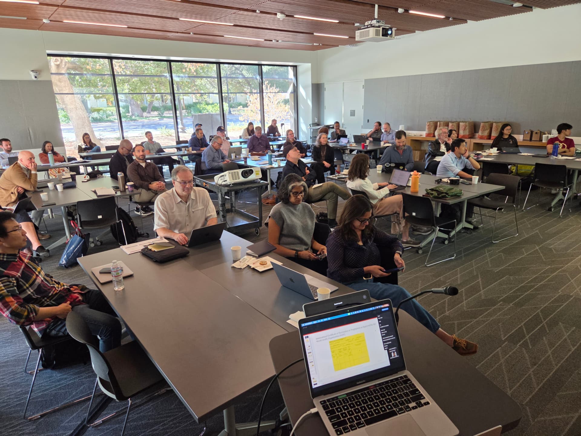 Participants listening to a presentation at the Portable Memory + HCP workshop.