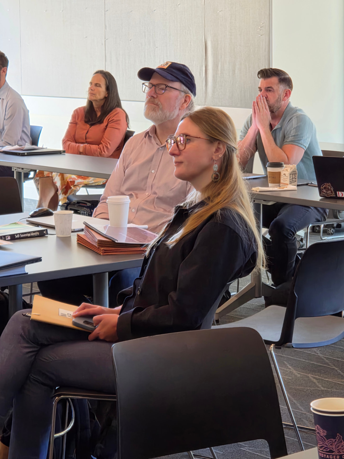 A participant speaking during a working session at the workshop.